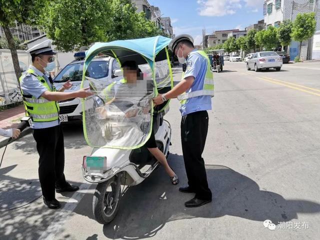 【交通秩序整治百日行动】私装遮阳伞危险!交警部门上路严查……
