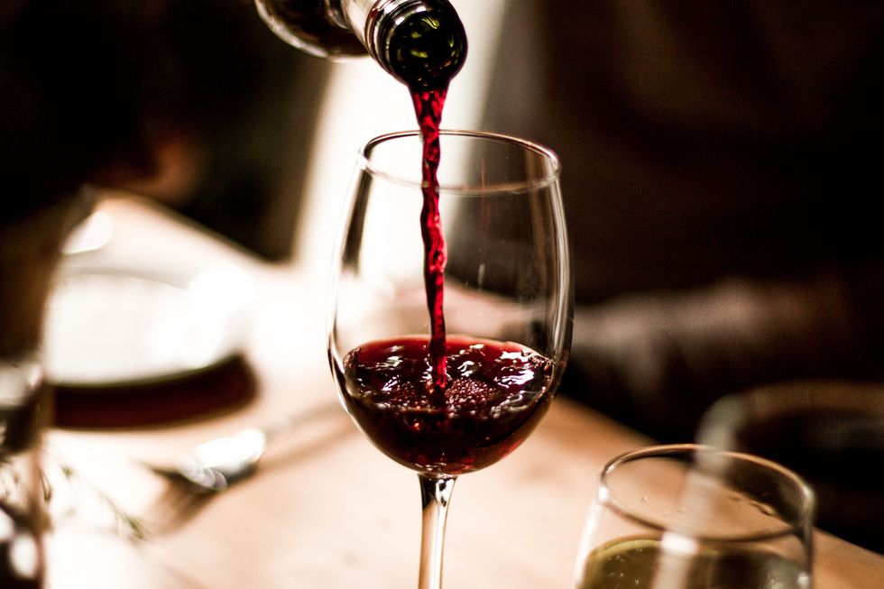 wine-pouring-into-glass-royalty-free-image-1603961527-.jpg